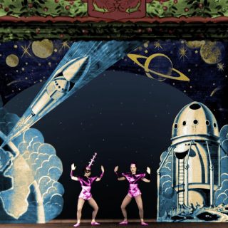 The Collins Variety Agency - a coloured still featuring the great scenic work of Bill Grayson. #varietytheatre #scenicpainting #scottishtheatre #theatredesign #hgwells #georgesmelies #rocket #bbcscotland